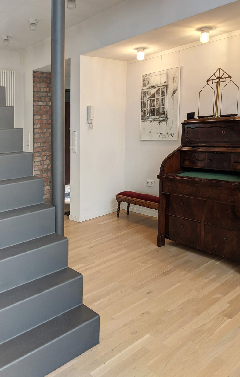 Gästehaus Innenansicht Umbau Treppe Metall Julian Wolf Architektur